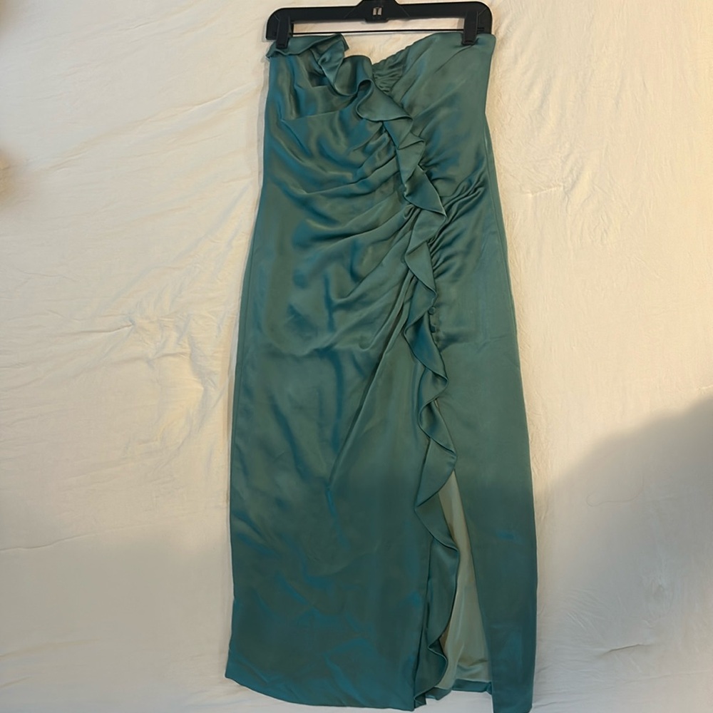 Jonathan Simkhai green ruffle strapless satin dress.